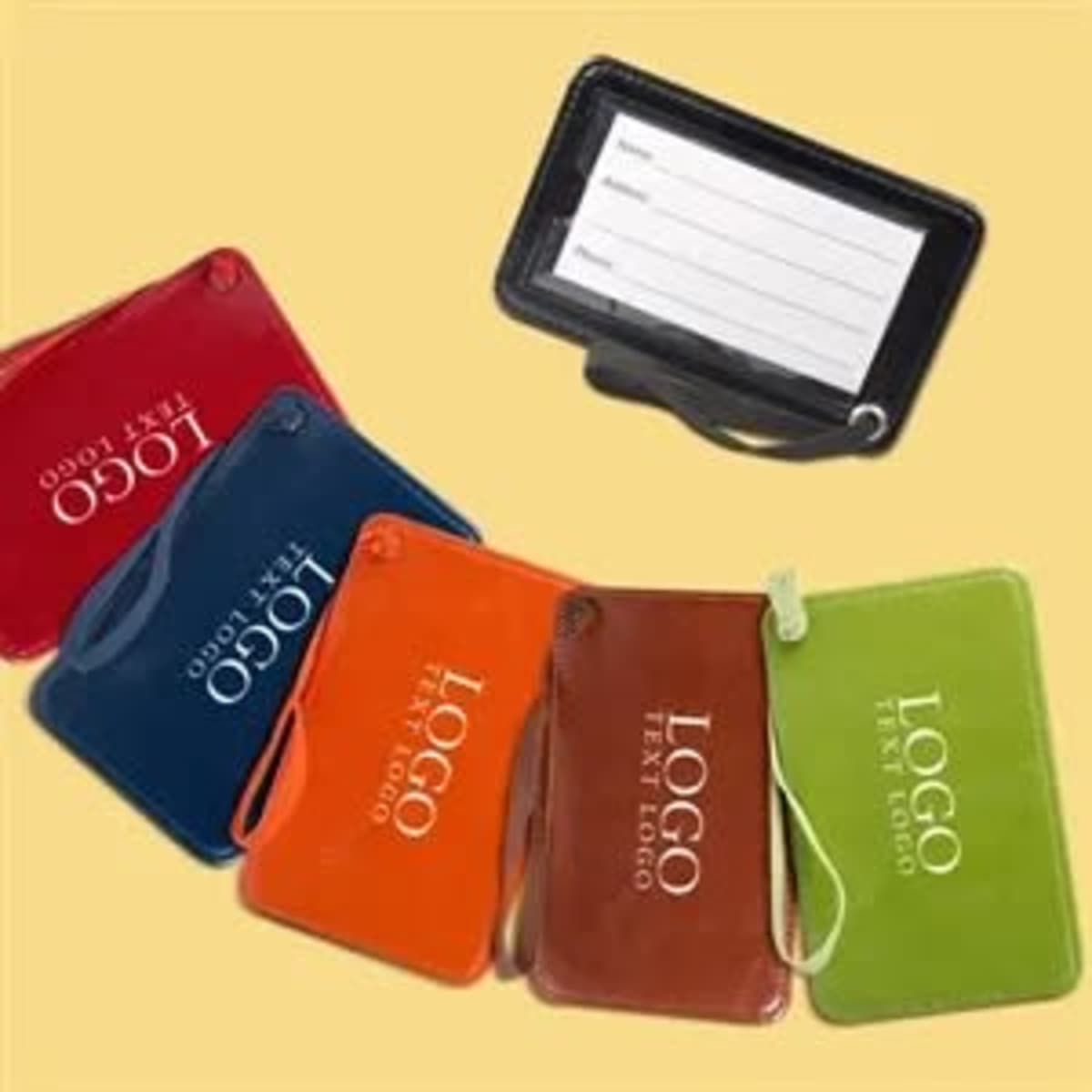 Custom Venezia luggage tags in various colours: red, orange, green, blue, and black, featuring a placeholder for personal information.