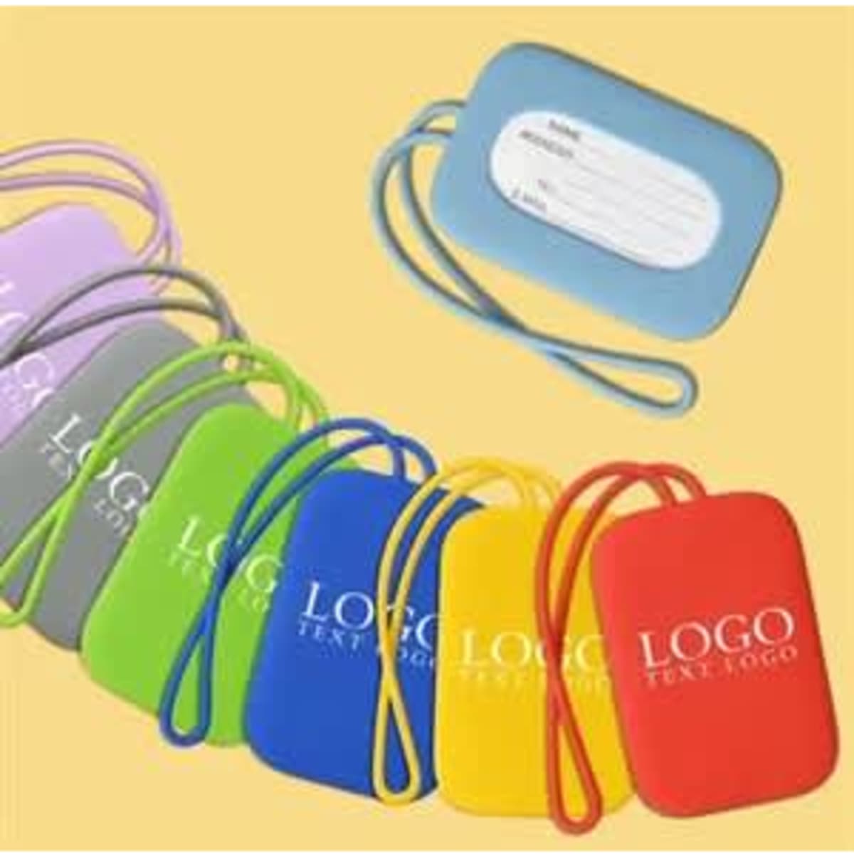 A set of custom silicone luggage tags in various colours, featuring a space for personal information and a logo.
