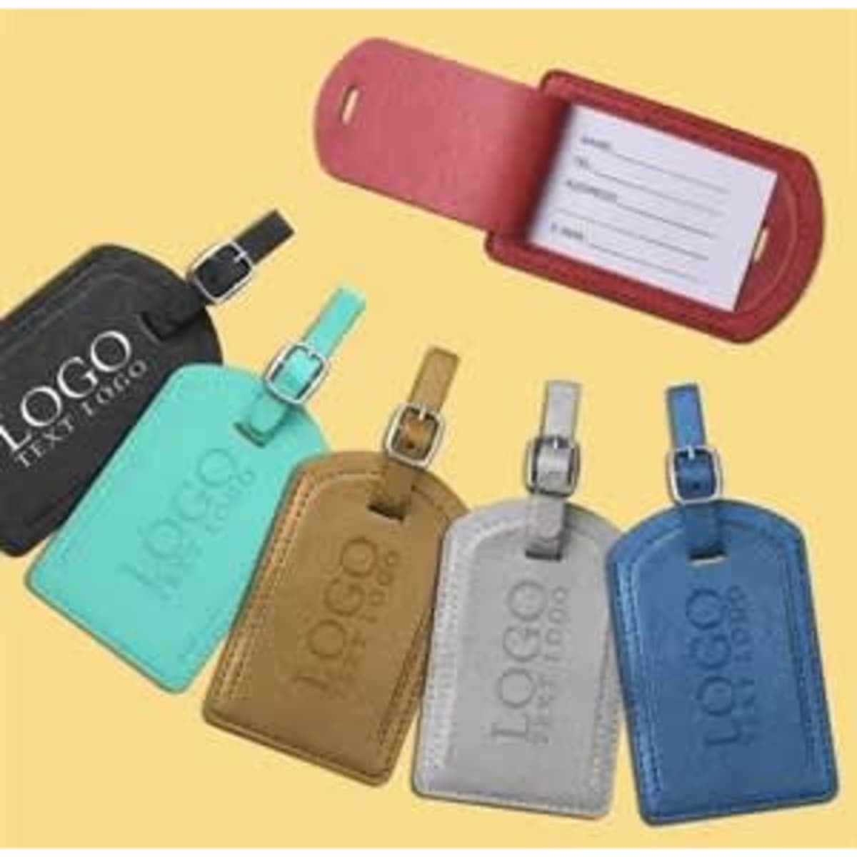 A collection of business luggage tags in black, blue, turquoise, brown, and red, featuring a logo and a card holder.