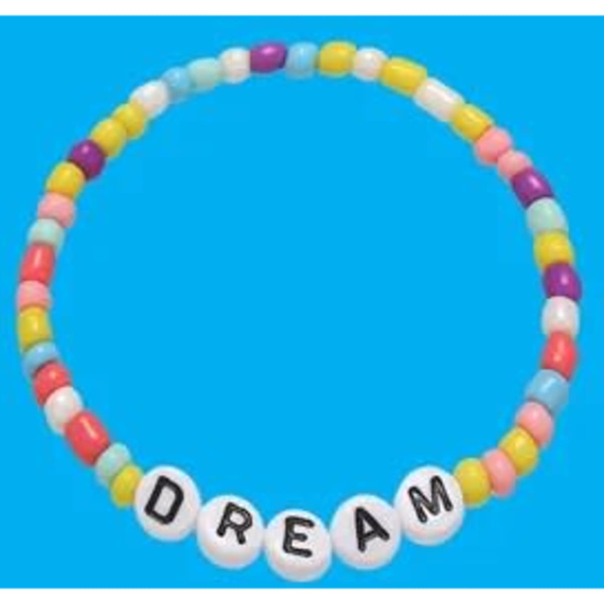 A beaded elastic bracelet featuring multicoloured beads and the word "DREAM" in white letters.