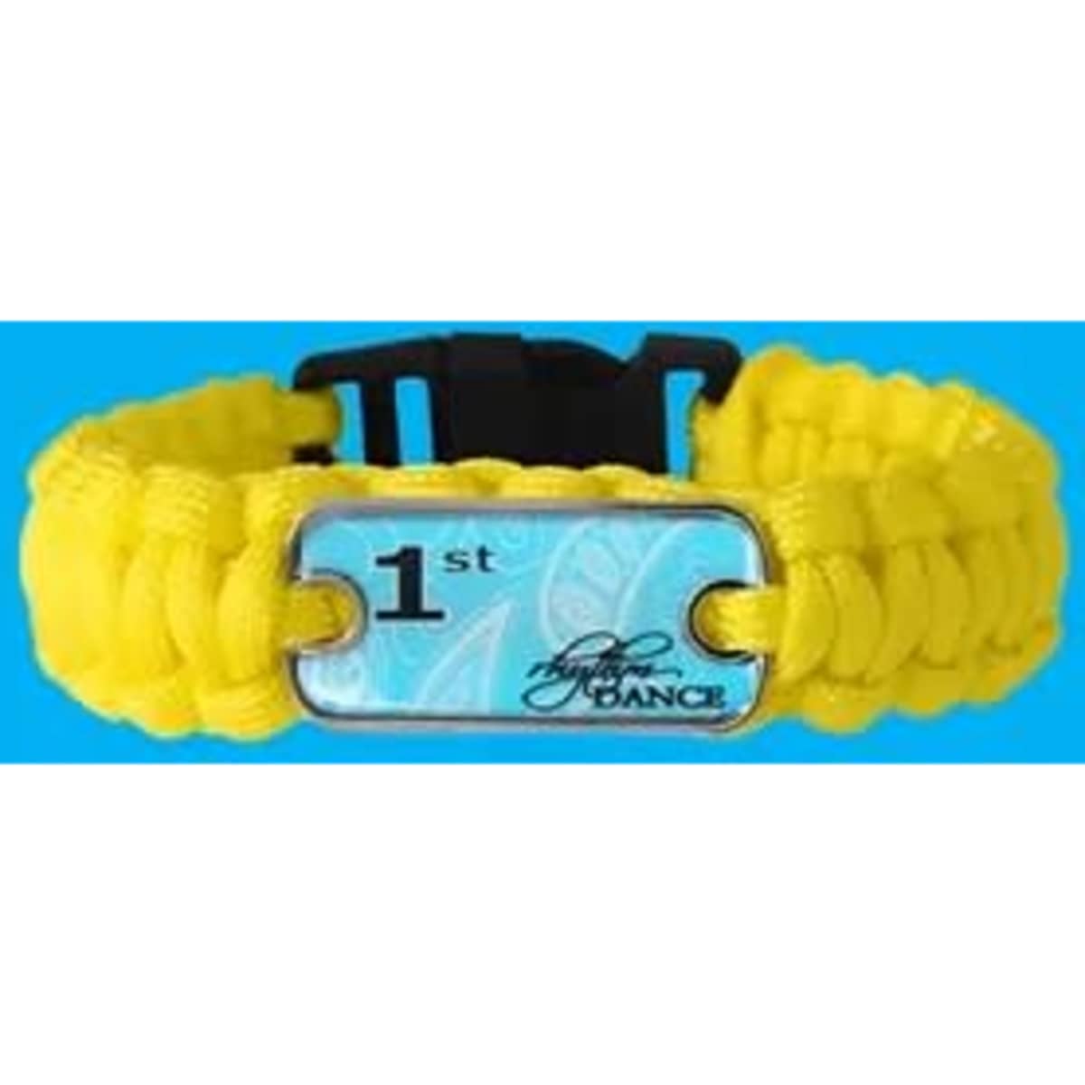 A yellow paracord survival bracelet featuring a metal plate with a design. It includes a plastic buckle and has a logo.