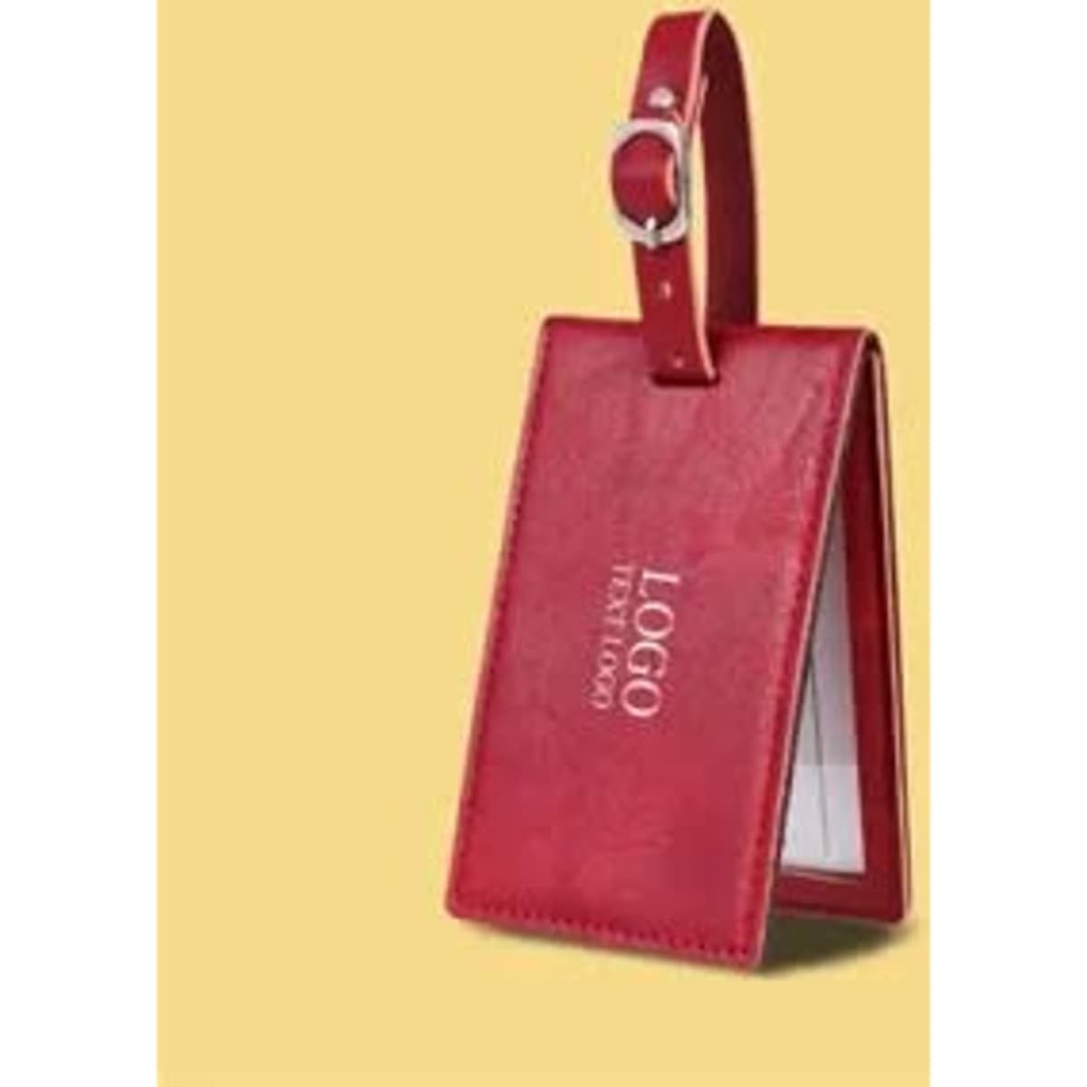 A red leather luggage tag with a strap and a logo, featuring a pocket for identification details.