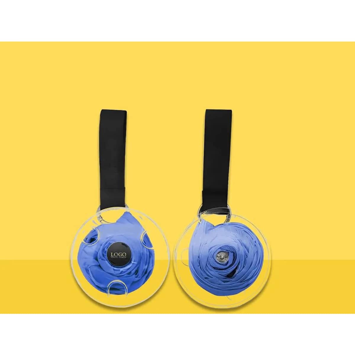 A portable shopping bag keychain in a circular clear case, featuring a rolled blue bag and a black strap.