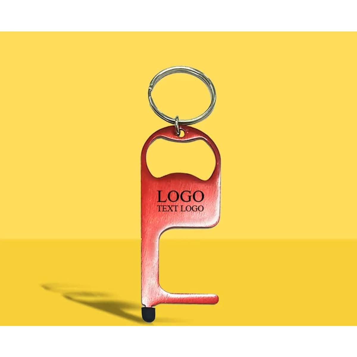 A red multitool keychain with a bottle opener and an attached keyring. It features a logo on the surface.