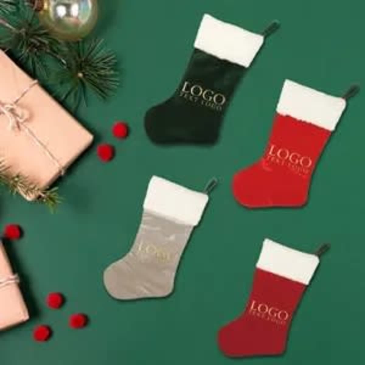 Four velvet Christmas stockings in green, red, silver, and white, displayed on a green background with decorative elements.