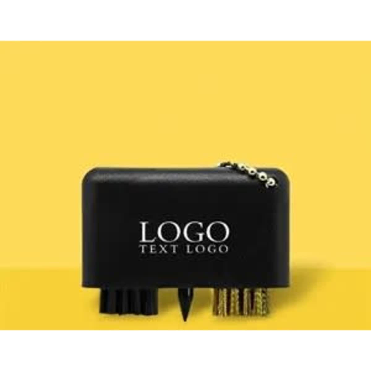 A black plastic golf brush keychain featuring brushes and a small spike, accompanied by a logo.
