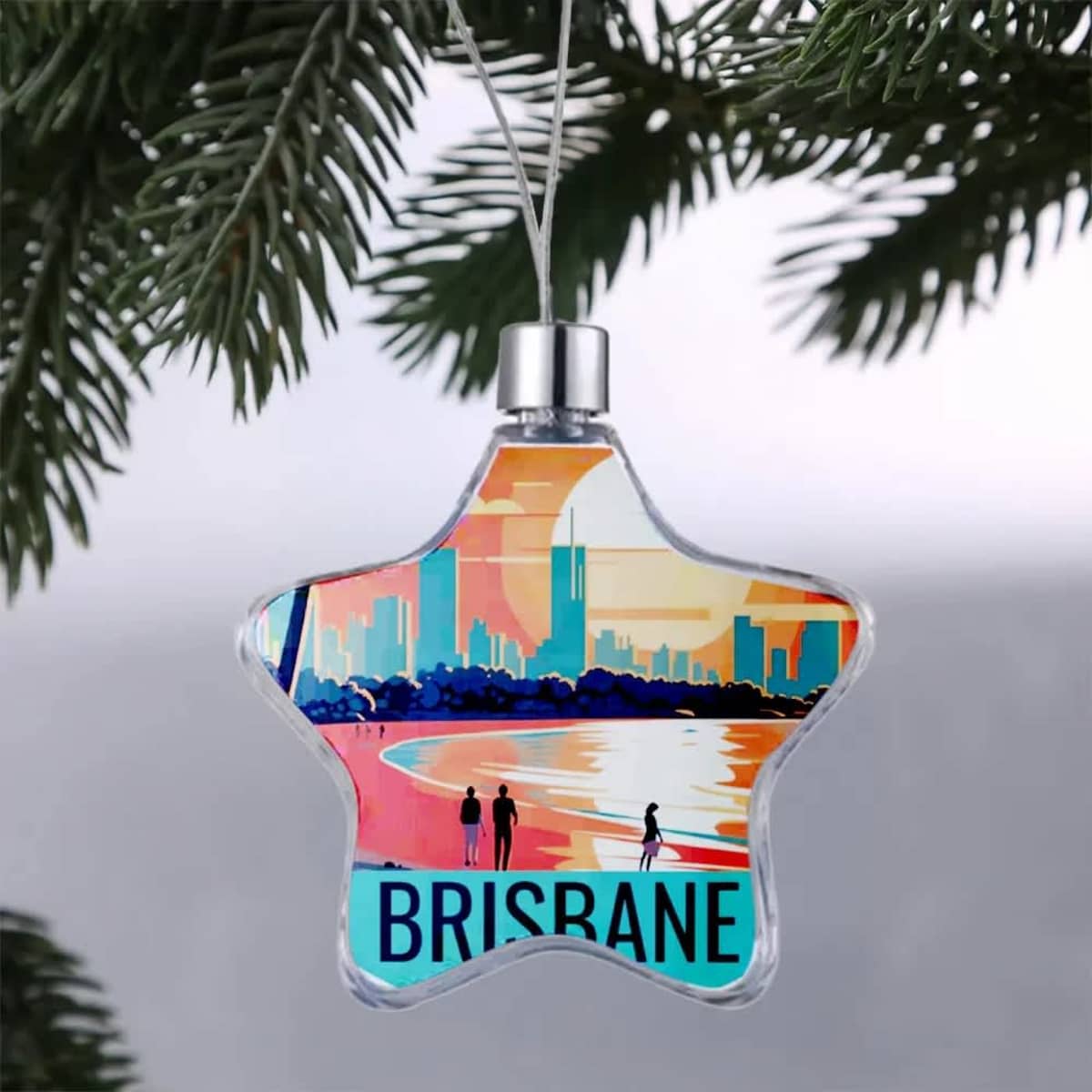 A star-shaped photo frame in clear acrylic features a vibrant Brisbane skyline and beach scene.