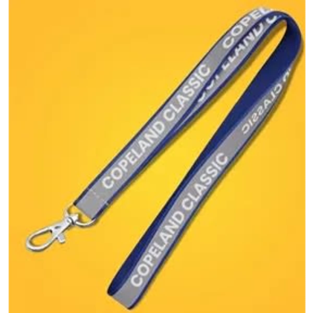 A reflective lanyard in navy blue and grey with a clip at one end and a logo present.