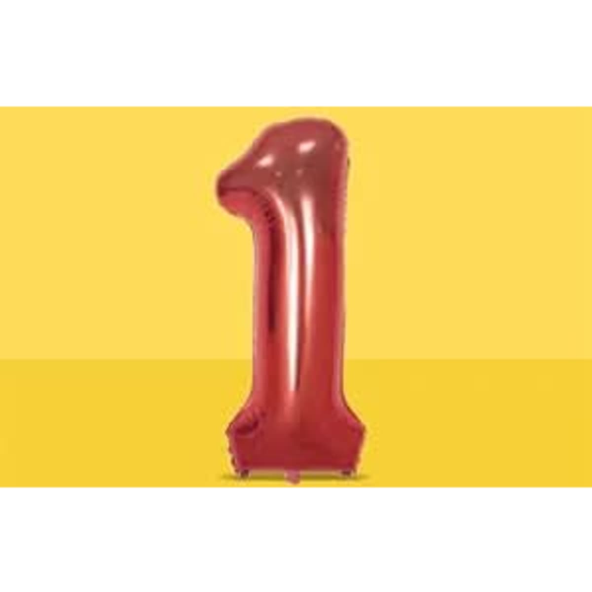 A large, shiny red foil balloon shaped like the number one, set against a yellow background.