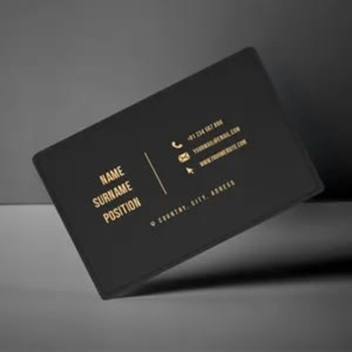 A sleek black NFC metal business card featuring gold text and a logo. Ideal for professional use.