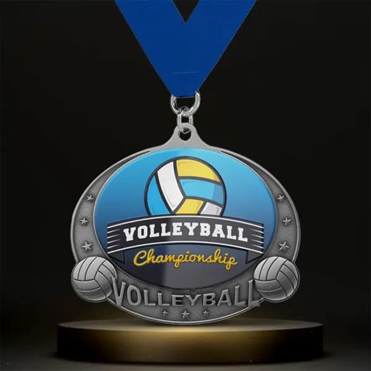 A silver volleyball medal with a blue and yellow design, featuring a blue ribbon for wearing.