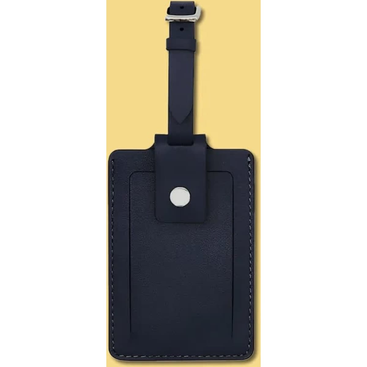 A navy genuine leather luggage tag featuring a snap closure and a strap for attachment.