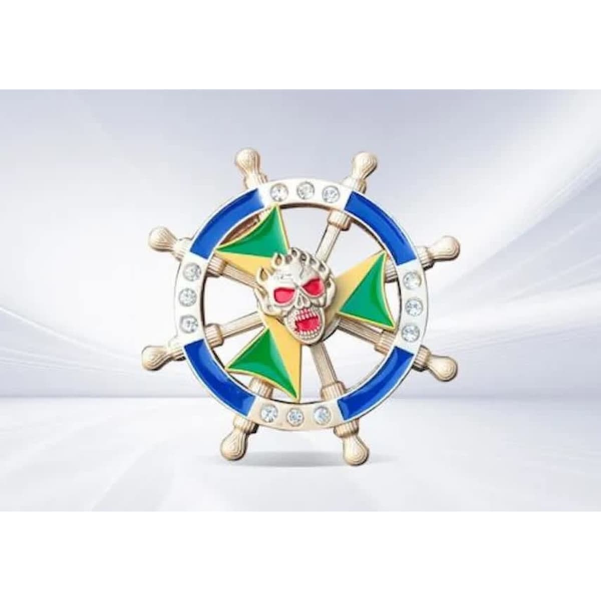 A decorative emblem featuring a ship's wheel design with a skull and crossbones, adorned with green and blue accents.
