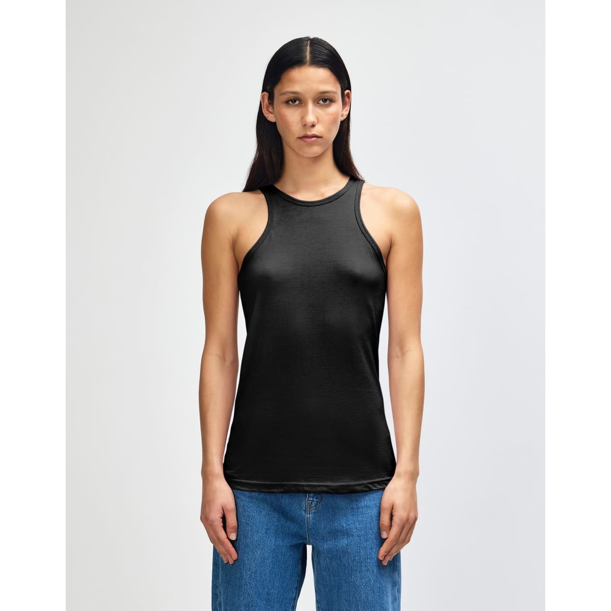 A black racerneck tank top for women with a fitted design and a logo. Ideal for casual wear.
