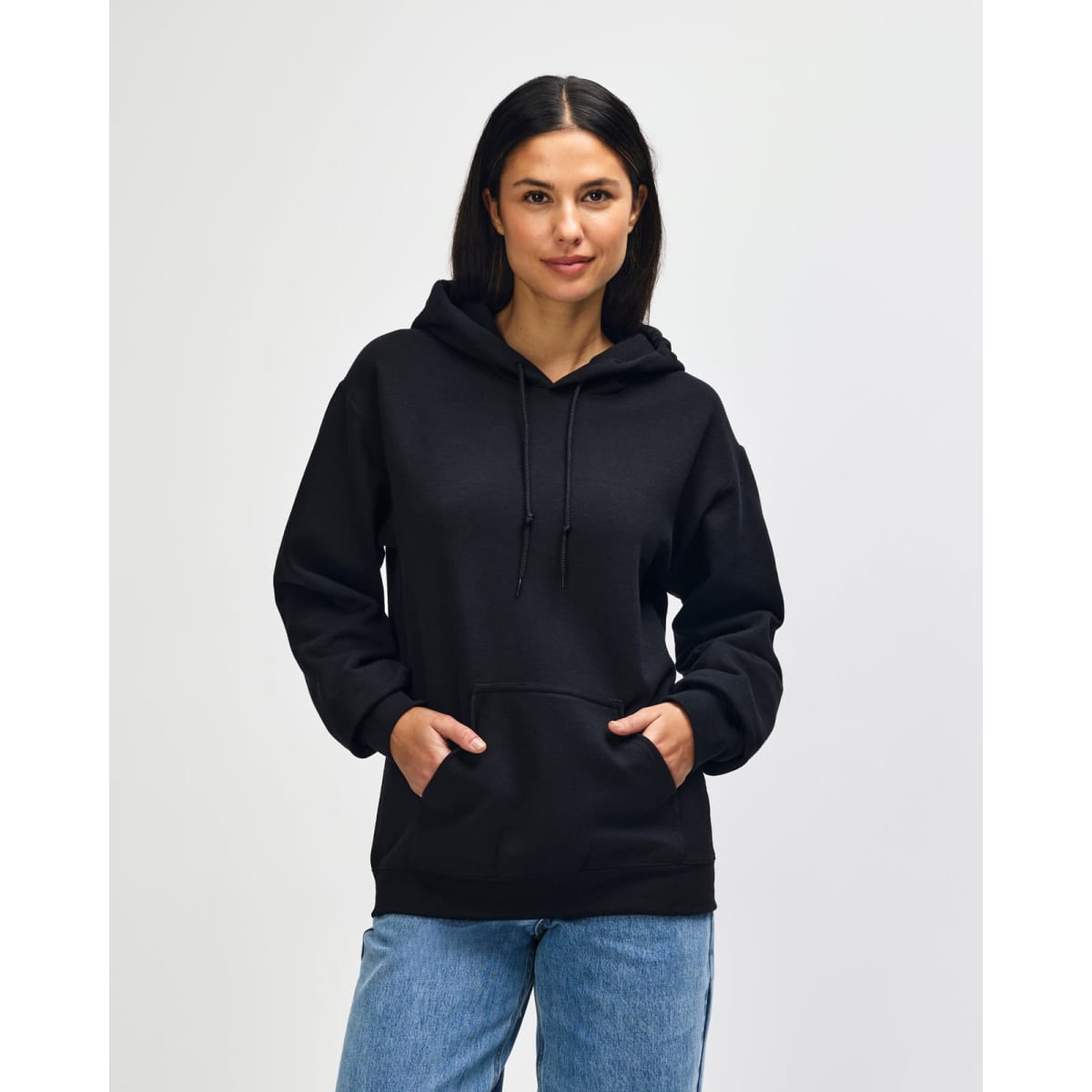 A dark grey Gildan Heavy Blend adult hooded sweatshirt displayed on a model with a neutral background.
