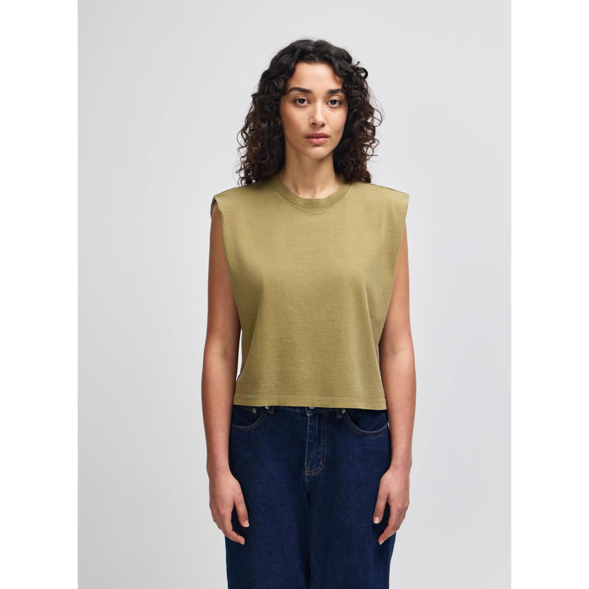 A women's muscle T-shirt in olive green, featuring a sleeveless design with a cropped fit and a logo.