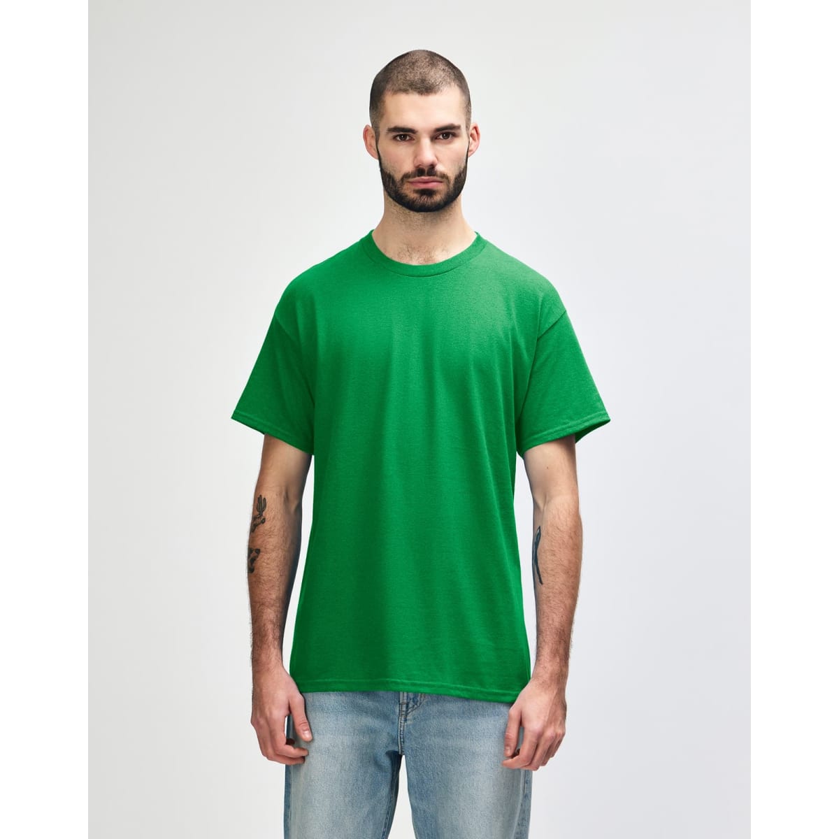 A green Gildan Heavy Cotton adult t-shirt displayed on a male model against a plain background.