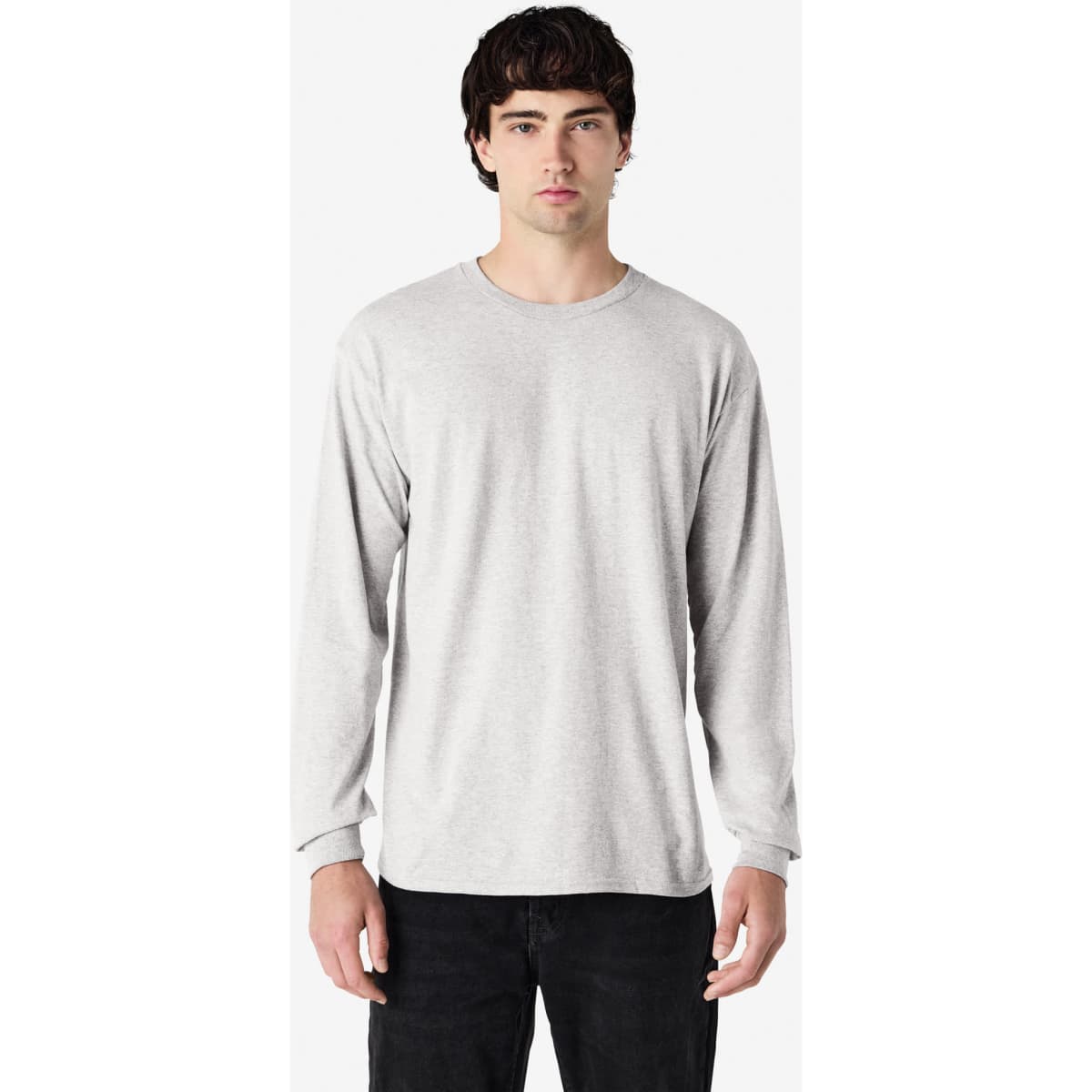 A light grey long sleeve t-shirt featuring a round neckline and a subtle branded logo.