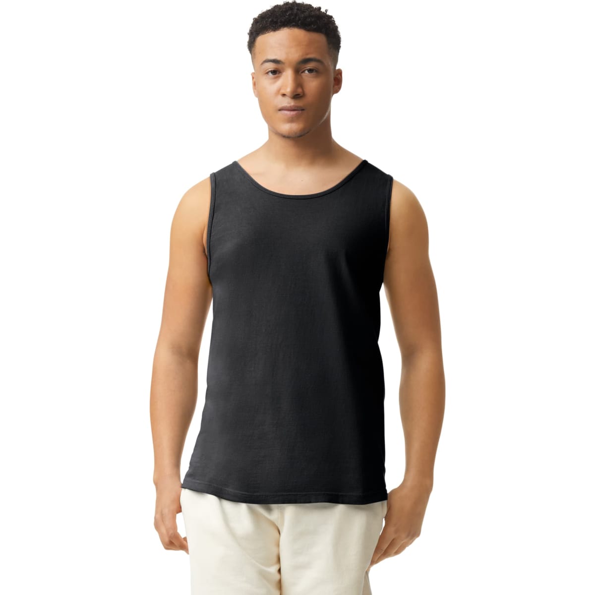 A black adult tank top displayed on a model. The tank has a crew neck and no sleeves, featuring a logo.