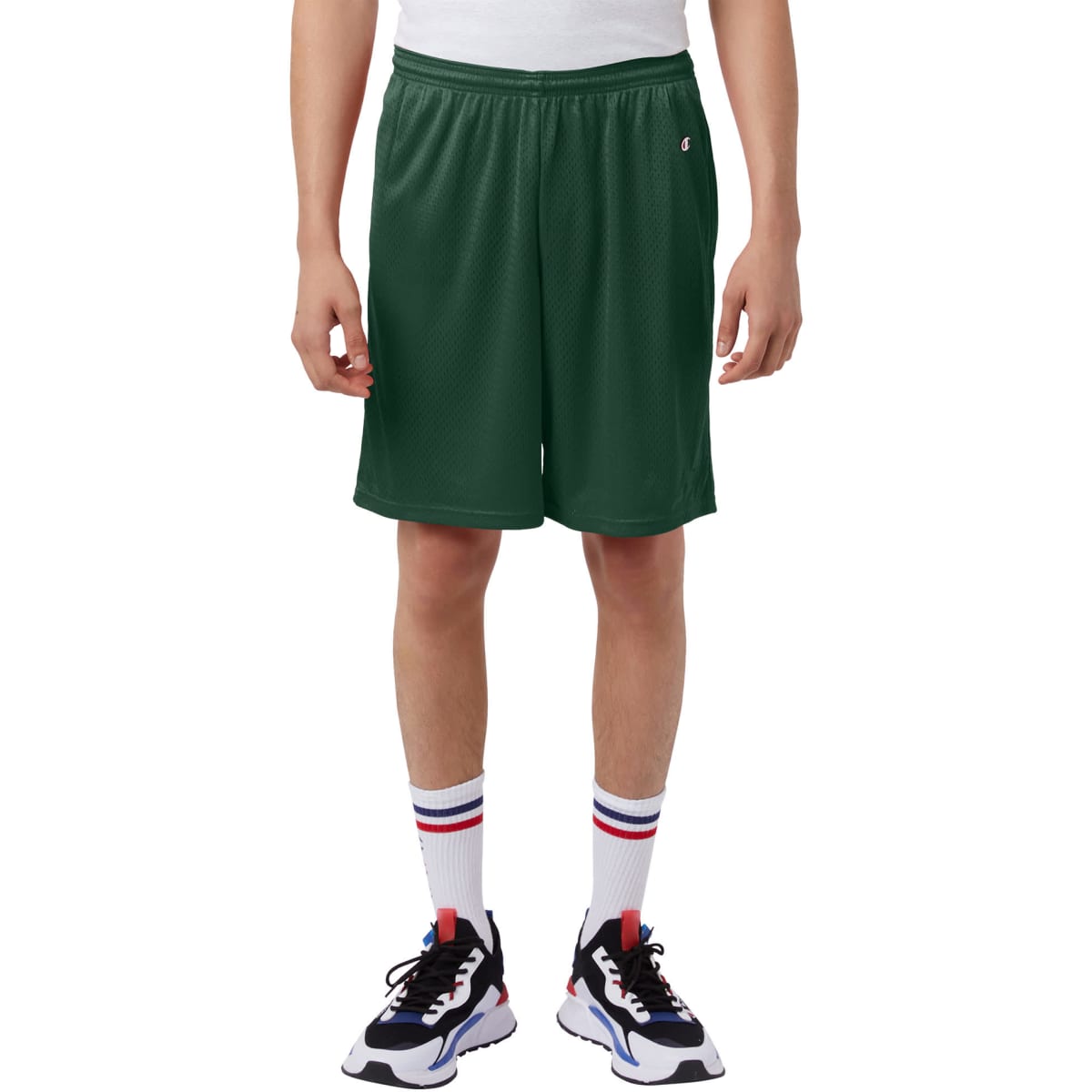 Green mesh sports shorts with pockets, featuring an elastic waistband and a logo. Suitable for active wear.