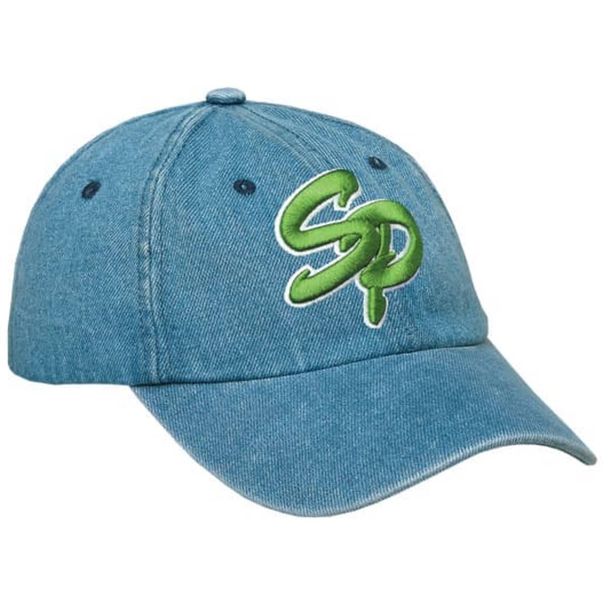 A denim blue cap featuring a green embroidered logo. The cap has a curved brim and adjustable strap.
