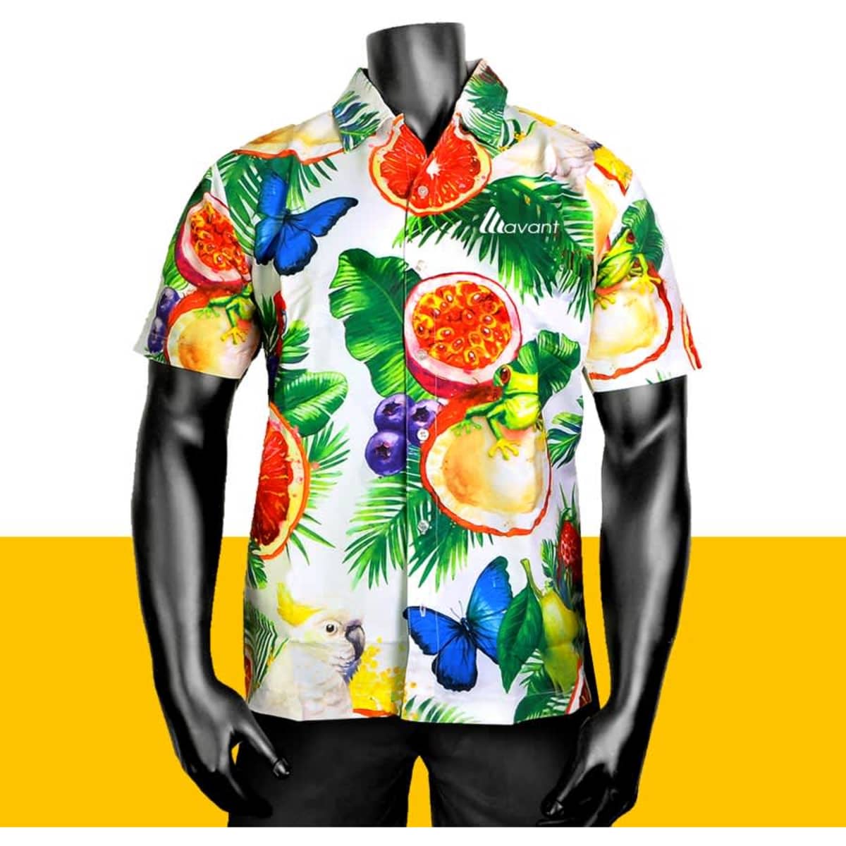 A vibrant, short-sleeved button-up shirt featuring tropical fruit and butterfly prints in various colours. It has a logo.