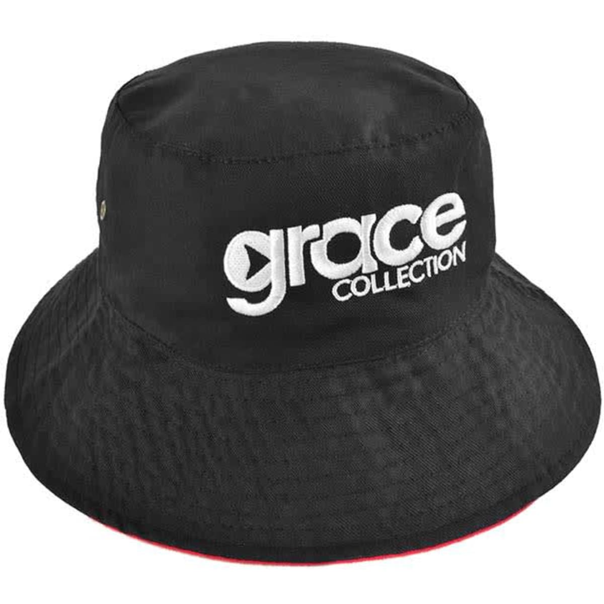A reversible bucket hat in black with an adjustable toggle and a logo on the front.