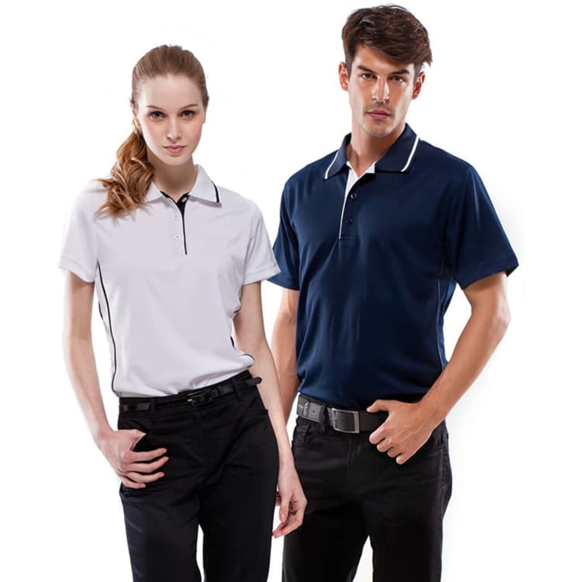 A white polo shirt and a navy blue polo shirt, worn by a woman and a man respectively, both featuring a logo.
