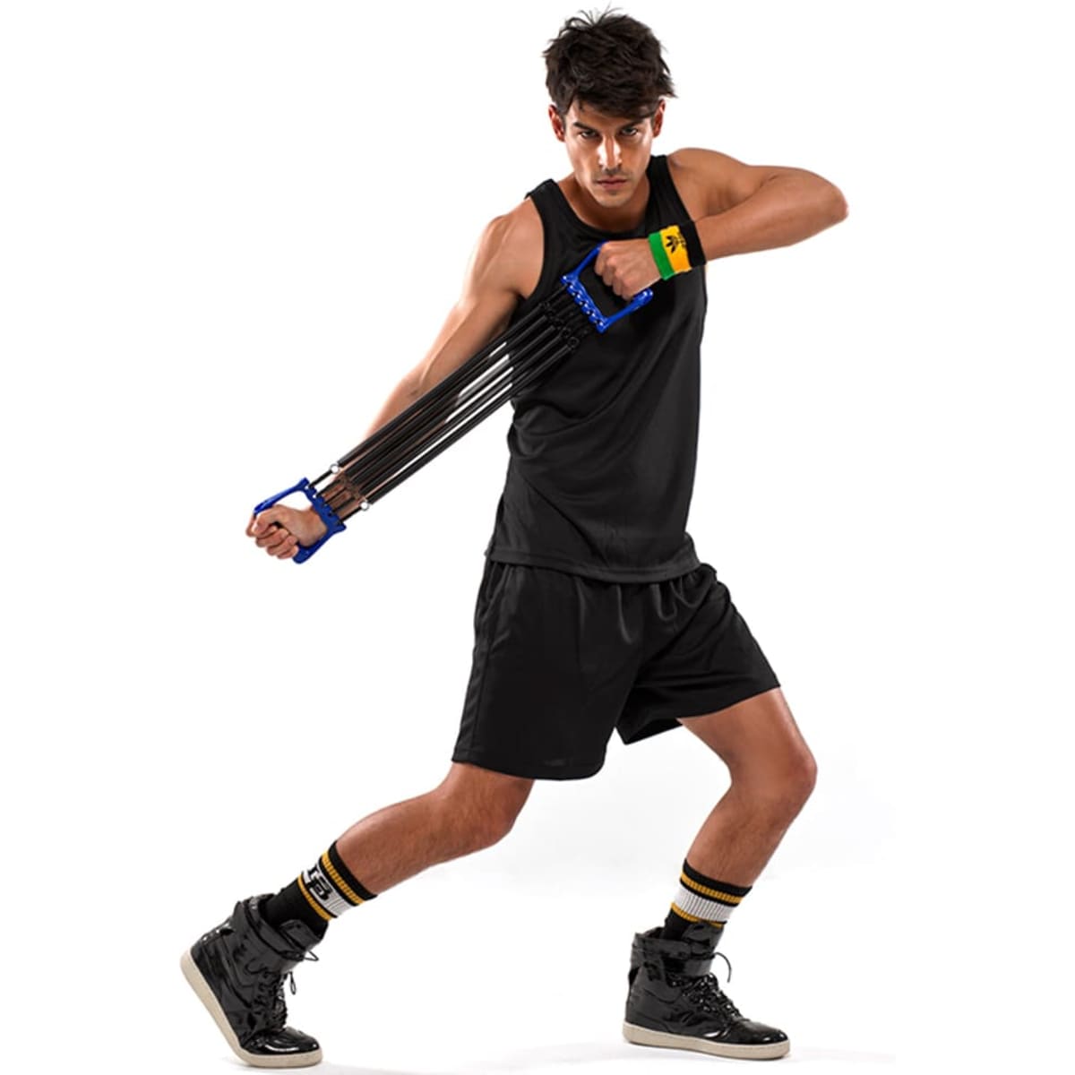 A black singlet worn by a male model, demonstrating an exercise with resistance bands. The outfit features shorts and sports shoes.