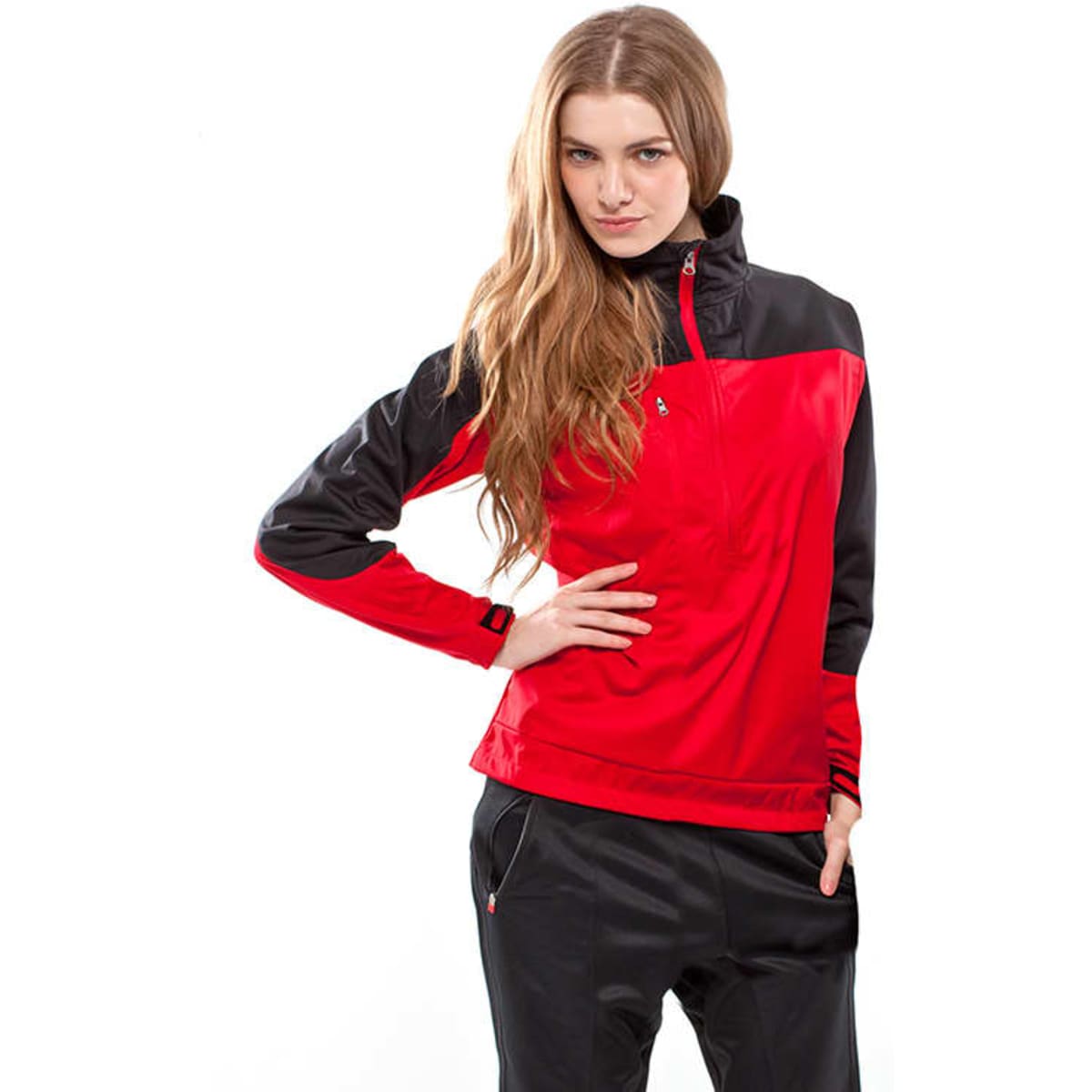 A red and black jacket with a high collar, featuring a zip closure and a logo. The model wears it confidently.
