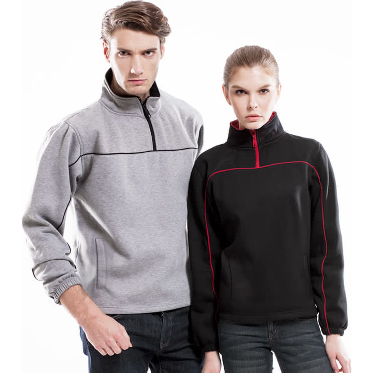 A grey and a black polar fleece jacket are displayed on male and female models, each featuring a zip collar and contrasting details.