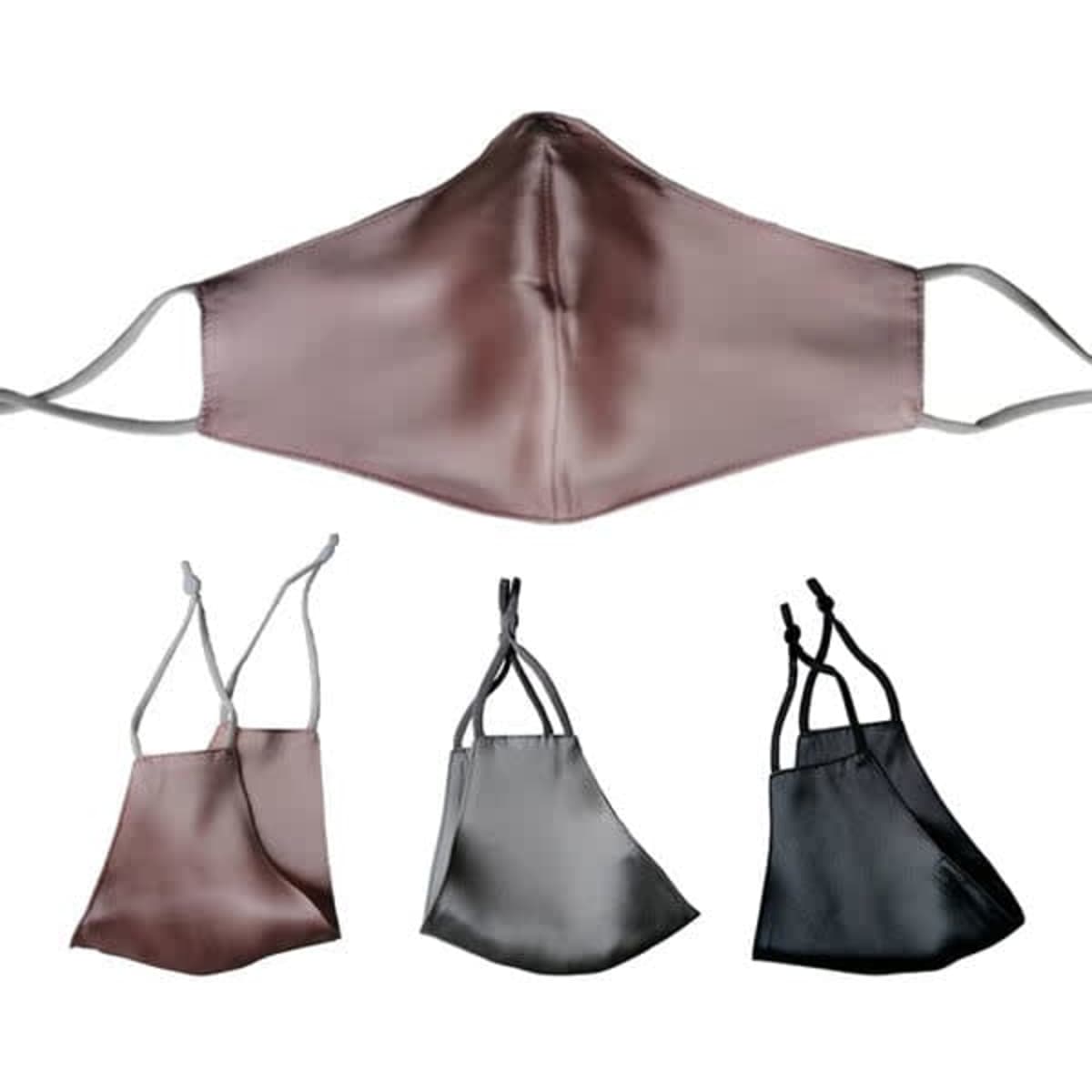 A silk face mask in shades of mauve, grey, and black with adjustable ear straps and a metal nose wire.