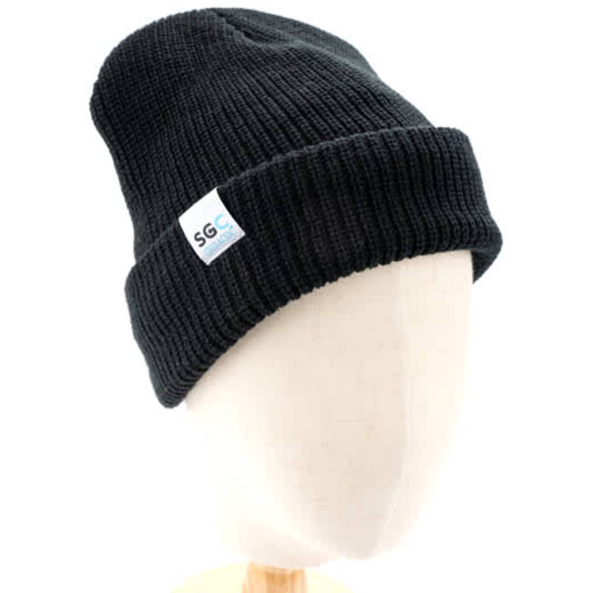 A black ribbed beanie displayed on a mannequin head, featuring a logo tag. Suitable for cold weather.