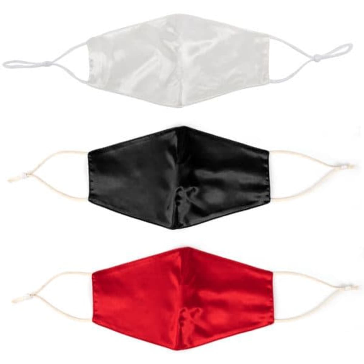 A set of three silk face masks in white, black, and red, featuring elastic ear straps and a smooth finish.