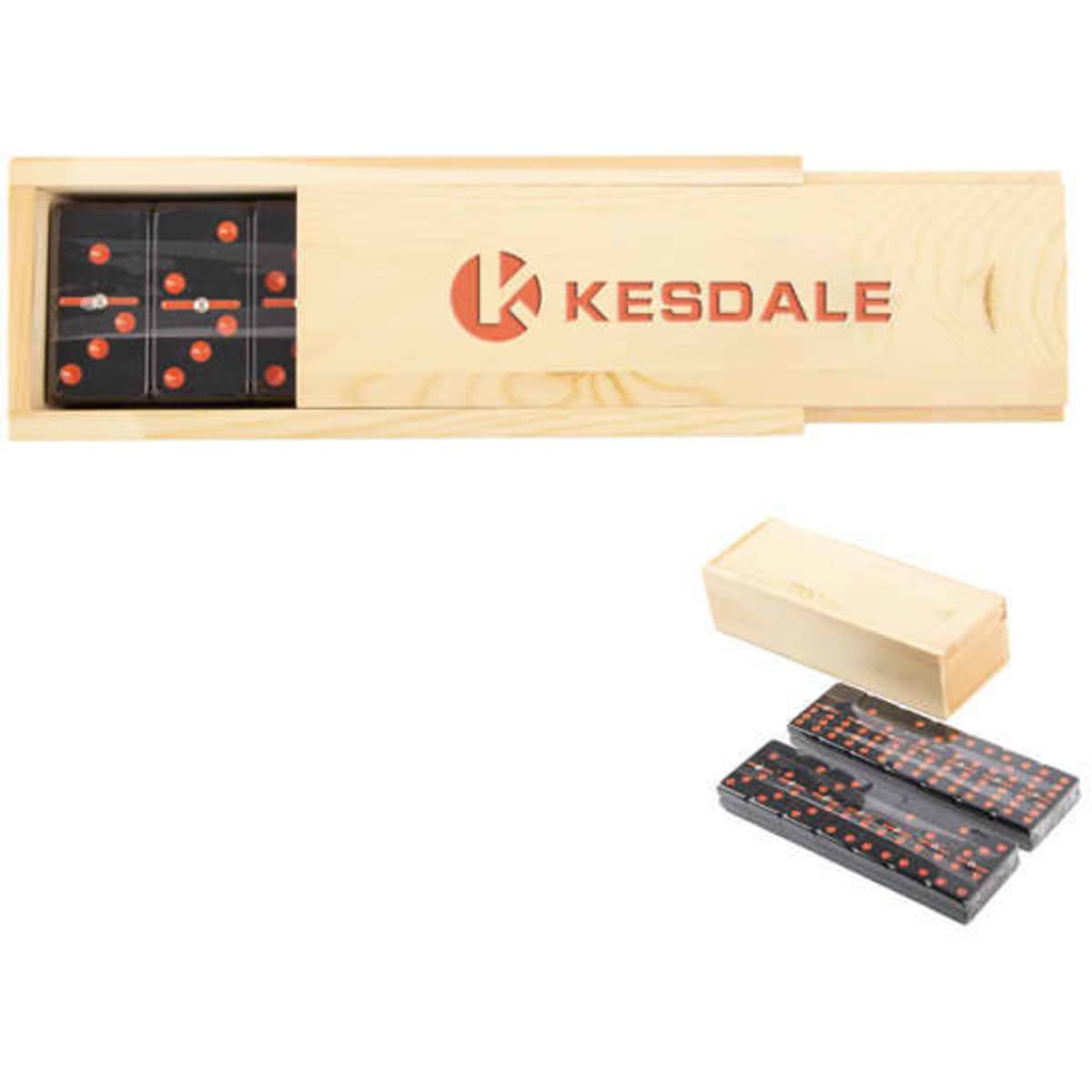 A wooden box contains a dominoes set with black tiles featuring red dots and a logo.
