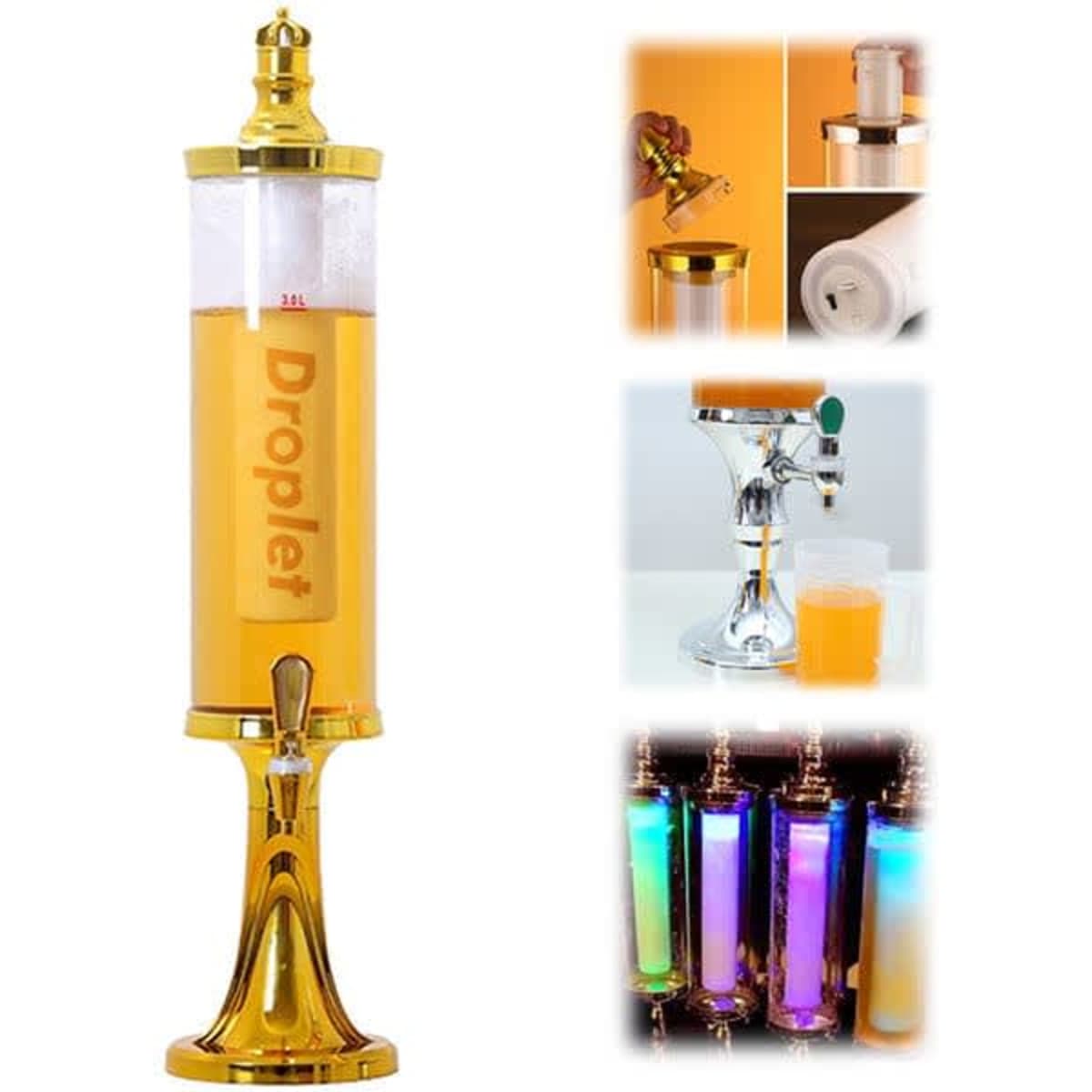 A drink tower in clear plastic with a gold base, featuring illuminated sections and a tap for dispensing beverages.