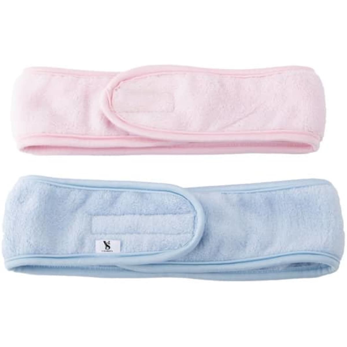 Two soft headbands in pink and light blue, featuring adjustable closures and a branding tag.