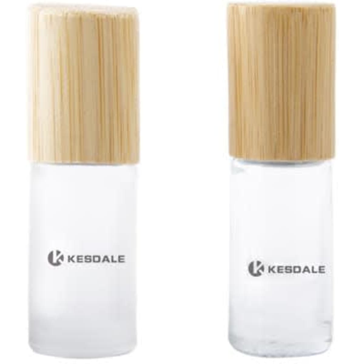 A glass roll-on bottle with a bamboo lid, featuring a transparent design and a logo on the surface.