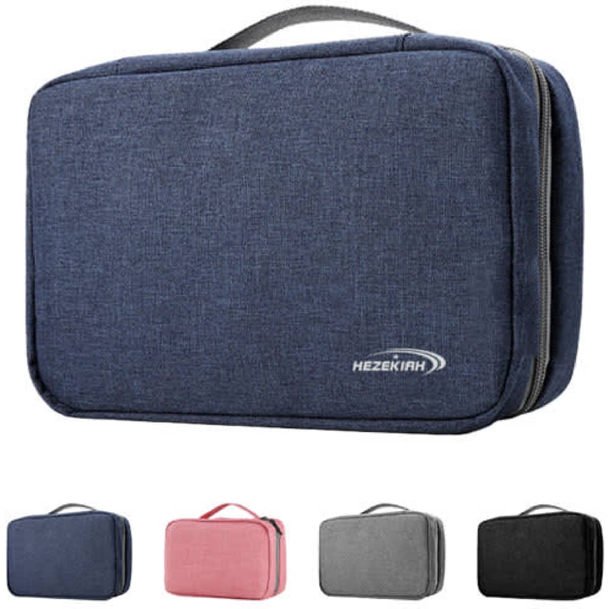 A navy trifold travel hanging toiletry bag with a carry handle, available in four additional colours: pink, grey, and black.