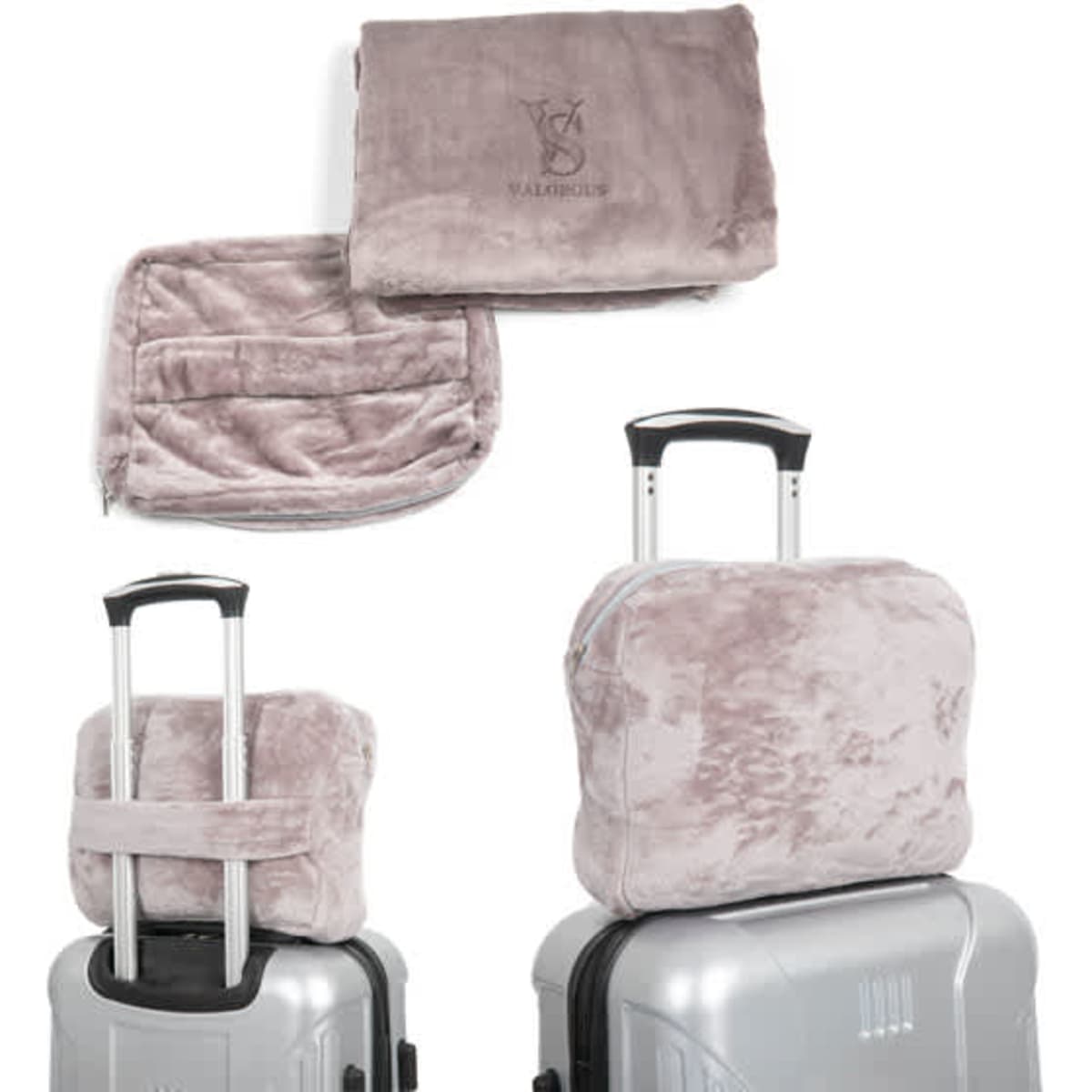 A flannel travel blanket in a soft mauve colour, accompanied by a matching zipper bag, displayed on luggage.