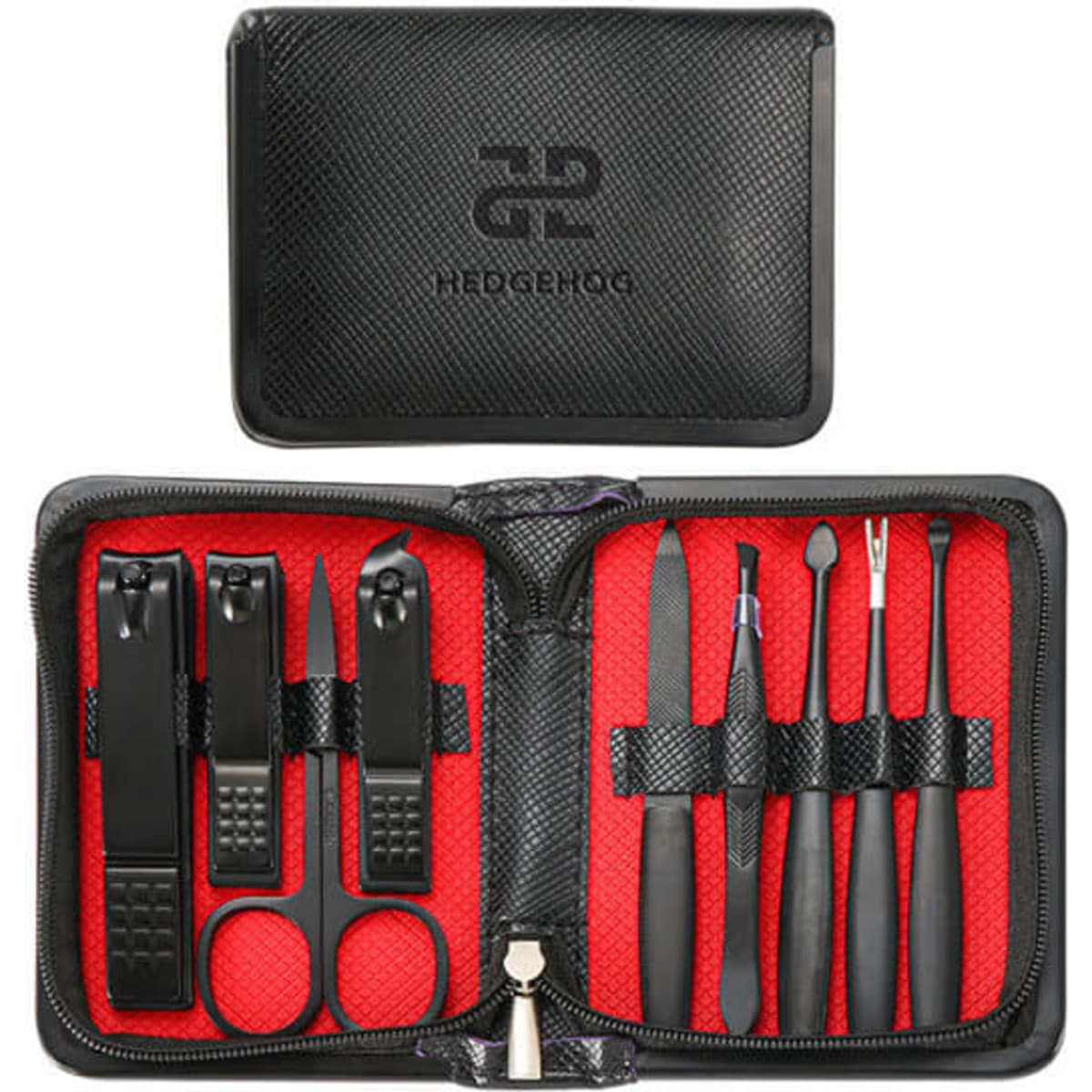 A black zippered case with a red interior containing various nail care tools, including clippers, scissors, and cuticle pushers.