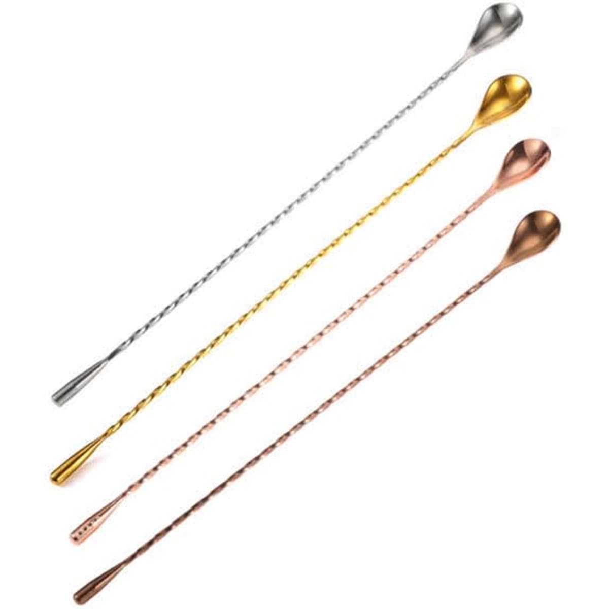 Three stainless steel mixing spoons in silver, gold, and rose gold, with varying designs and finishes.