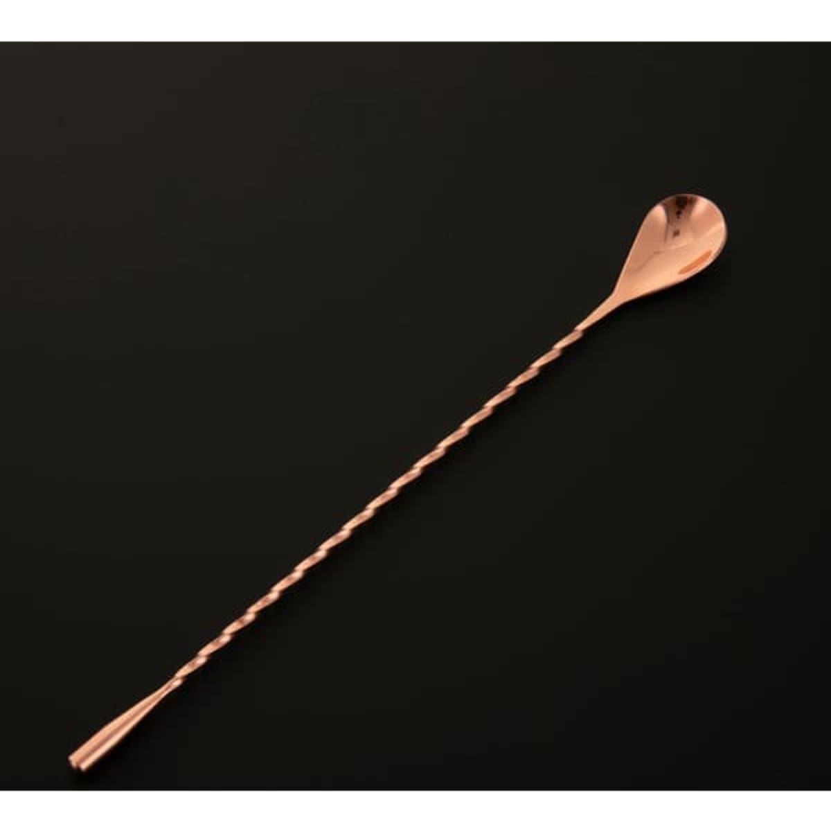 A twisted stem teardrop bar spoon in rose gold, featuring a sleek design and a stylish, elongated shape.