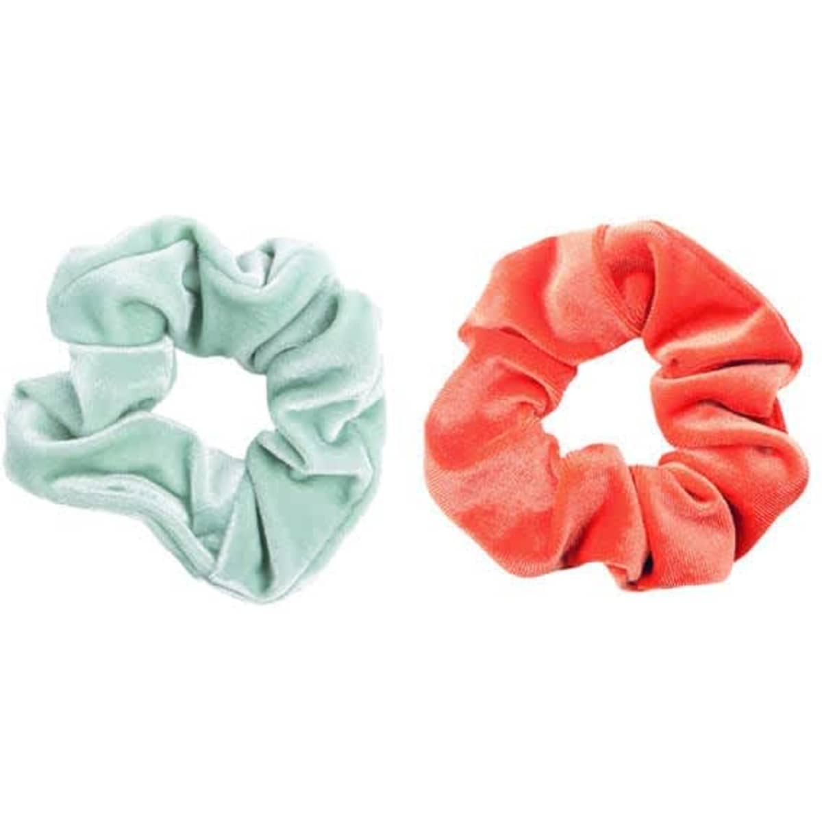 A green and an orange velvet hair scrunchie are displayed side by side, featuring a soft, textured fabric.