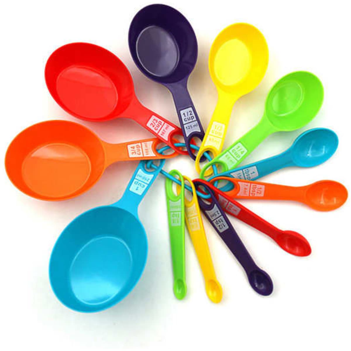 A set of 12 plastic measuring spoons in various colours, including red, orange, yellow, green, blue, and purple.