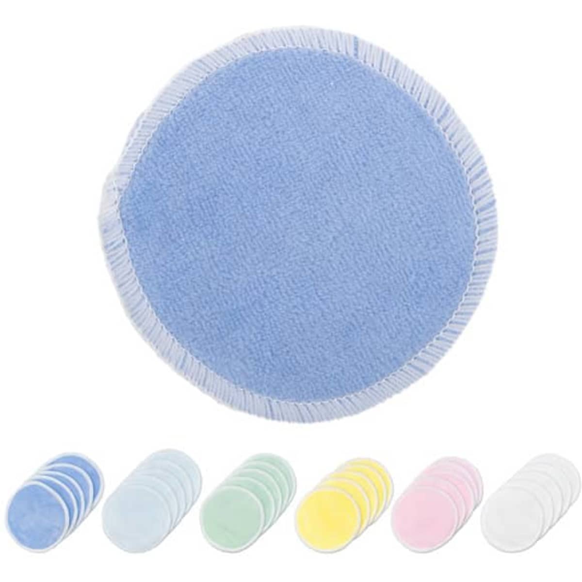 A circular reusable makeup remover pad in soft blue, with additional pads in pastel colours: green, pink, yellow, and white.