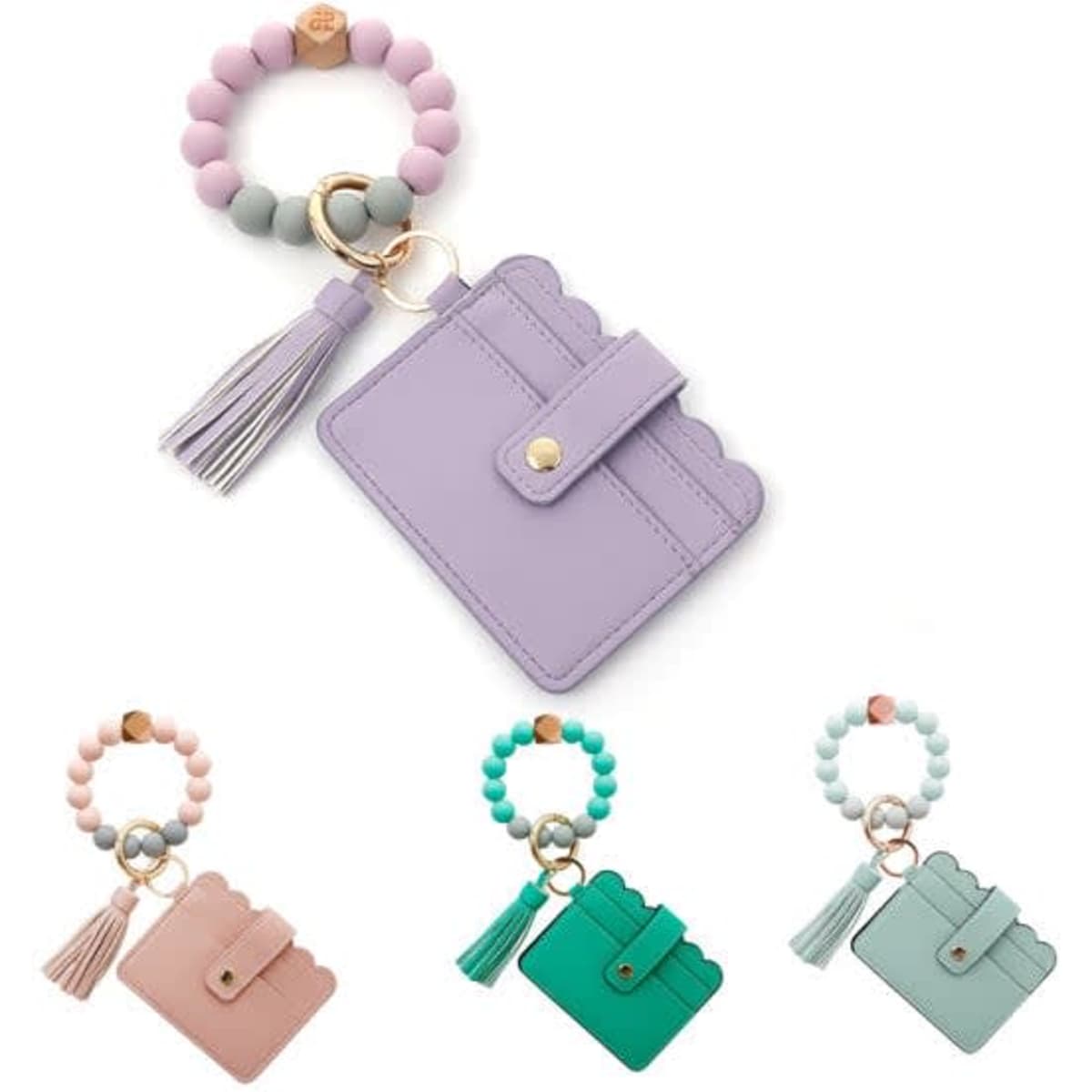 A collection of Women's Bracelet Wallet Keychains with tassels in lavender, mint green, pink, and teal.
