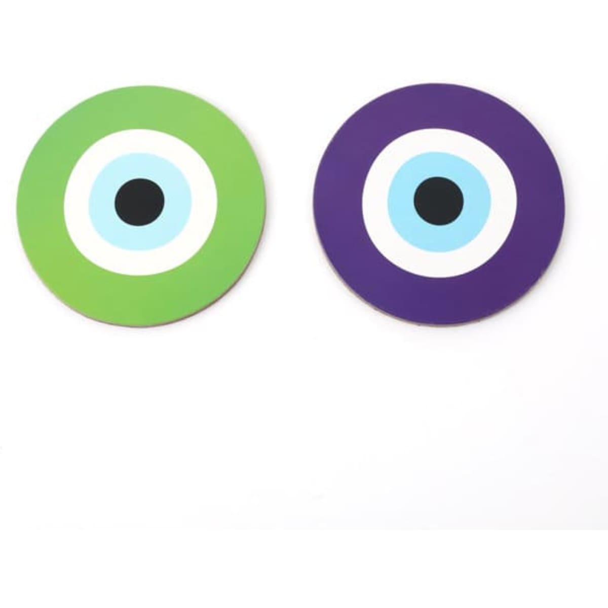 Two round cork drink coasters in green and purple with concentric circles of light blue, white, and black. Each coaster features a logo.