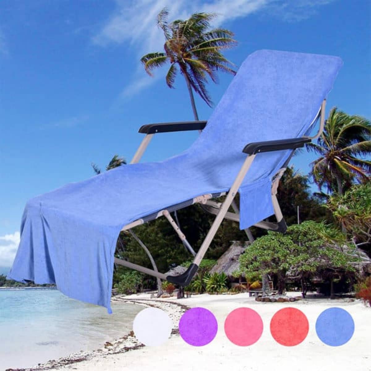 A blue microfiber beach chair cover drapes over a lounge chair beside a tropical beach with palm trees.