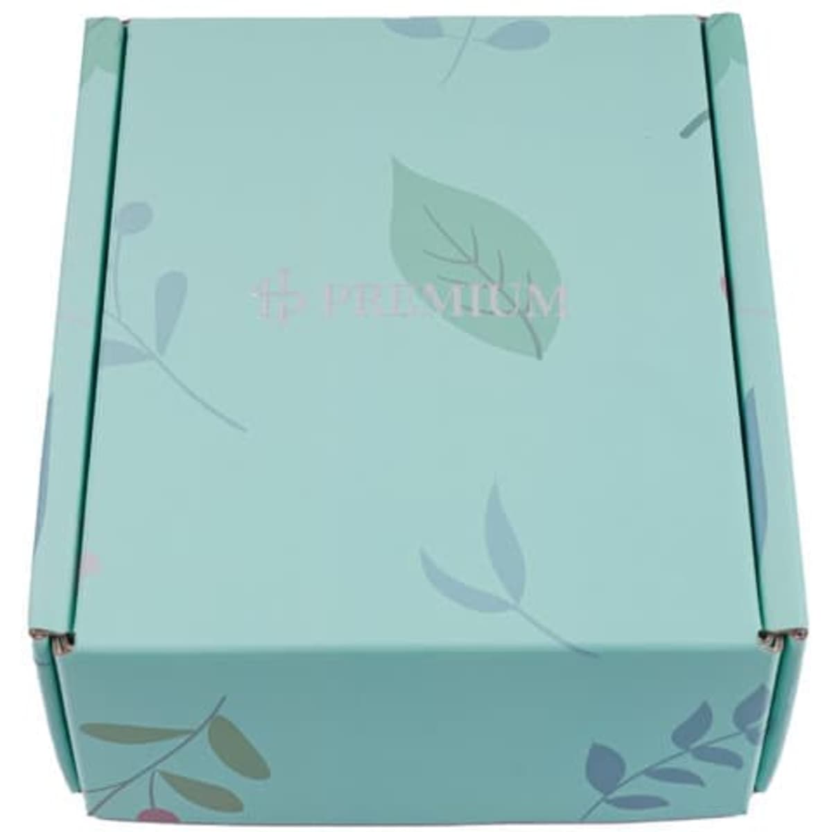 A teal paper box with a leafy design, featuring a logo on the surface.